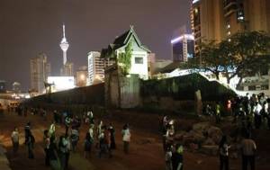 The 394-meter-long wall of Pudu Prison which is being demolished in downtown Kuala Lumpur, on Monday June 21, 2010.