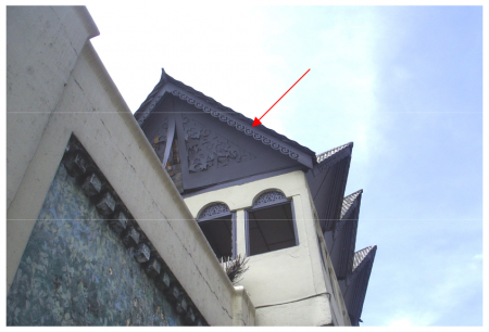 Figure 19: Visible wood carvings on the Minangkabau watch tower.