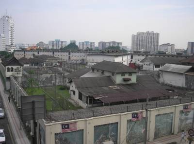 A view of the Pudu Prison's compound from the northwest end of the prison (as seen from a moving Kuala Lumpur Monorail train) in Pudu, Kuala Lumpur.